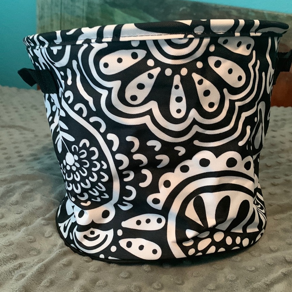 Thirty-one basket, black and white, drawing string lid